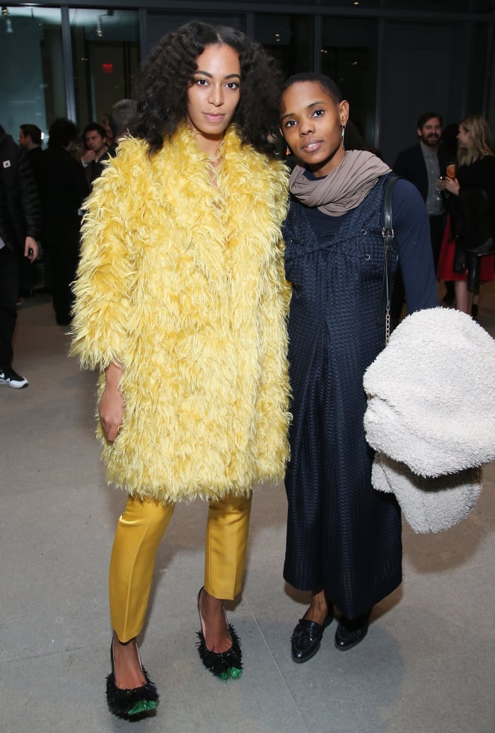 Solange Knowles in Katie Ermilio pants with friend at the Max Mara Whitney party. Photo: Neilson Barnard/Getty Images