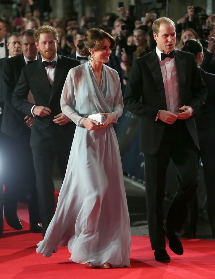 Prince Harry and Prince William accompany Kate Middleton in Jenny Packham to the 'Spectre' world premiere in London on Monday. Photo: Danny Martindale/WireImage