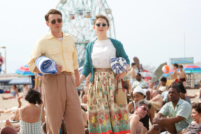 Beach fashion circa 1950, as modeled by Tony (Emory Cohen) and Eilis (Saoirse Ronan). Photo: Kerry Brown/Twentieth Century Fox Film Corporation