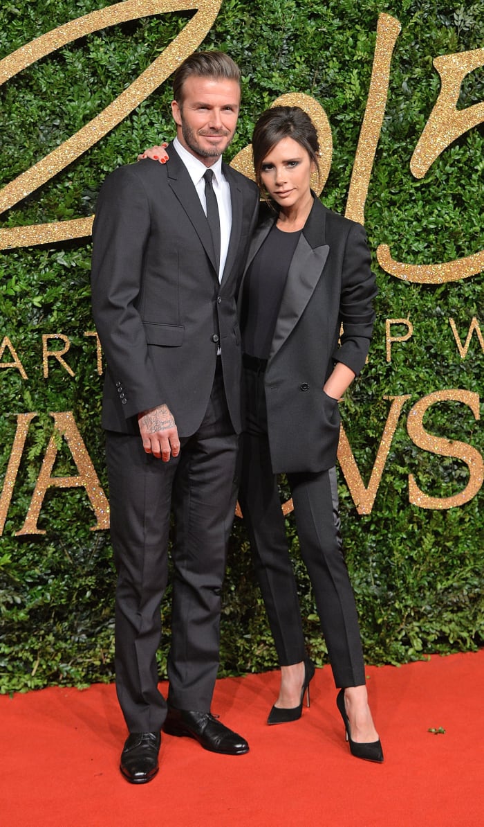 Matching suits for David and Victoria Beckham at the British Fashion Awards 2015 in London. Photo: Anthony Harvey/Getty Images