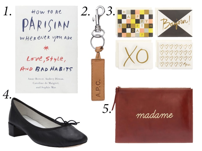 1. "How to Be a Parisian Wherever You Are," $15.43, available at Amazon. 2. A.P.C. 'Cuoio' keychain, $55, available at A.P.C. 3. Rifle Paper Co. x Garance Doré note cards, $18, available at Nordstrom. 4. Repetto chunky heel ballerina, $340, available at Farfetch. 5. Sézane Madame pouch, $95, available at Madewell.
