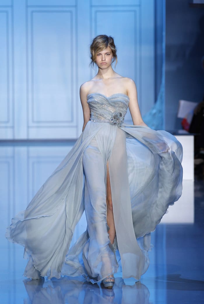 Clauson walking Elie Saab Haute Couture runway for Fall/Winter 2011-2012 in July 2011. Photo: Patrick Kovarik/AFP/Getty Images.