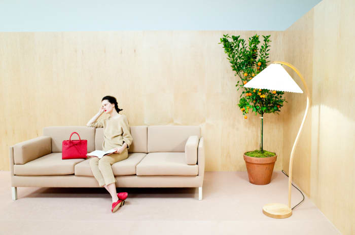 A model sits alongside Mansur Gavriel's new Sun bag in a pair of matching slipper heels. Photo: Mansur Gavriel