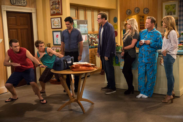 Uncle Jesse shows his 20-year-old twin sons how a MAN wears a bowling shirt. And Uncle Joey embraces the pajama trend. Photo: Michael Yarish/Netflix