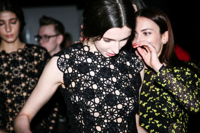 Designer Yasya Minochkina preps a model before her runway show in Moscow. Photo: Mercedes Benz Fashion Week Russia