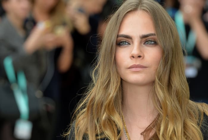 Cara Delevingne at Burberry Prorsum's spring 2016 runway show during London Fashion Week. Photo: Anthony Harvey/Getty Images