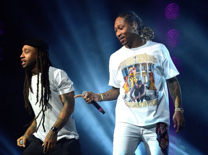 Future, performing with Ty Dolla Sign, in a "Purple Reign" tour T-shirt designed by Dbruze. Photo: Prince Williams/WireImage