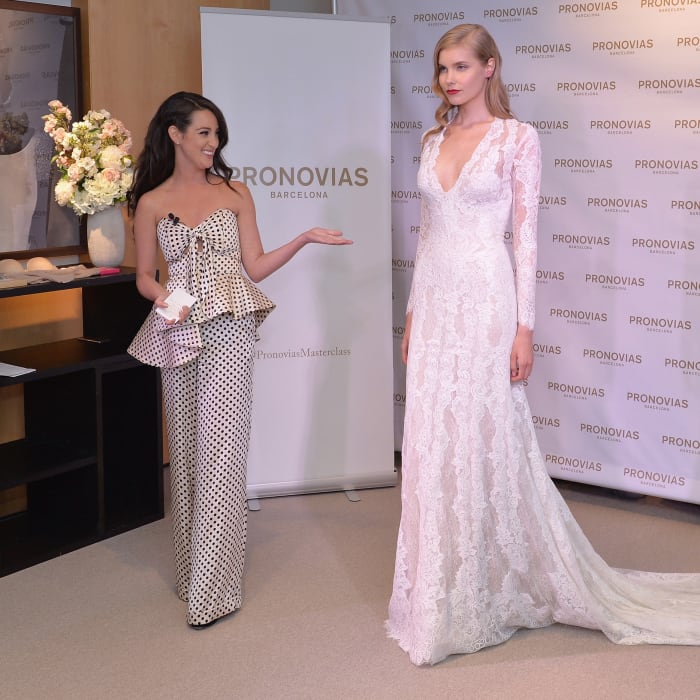 Stylist Micaela Erlanger with a model bride at the Pronovias flagship boutique in New York. Photo: Pronovias