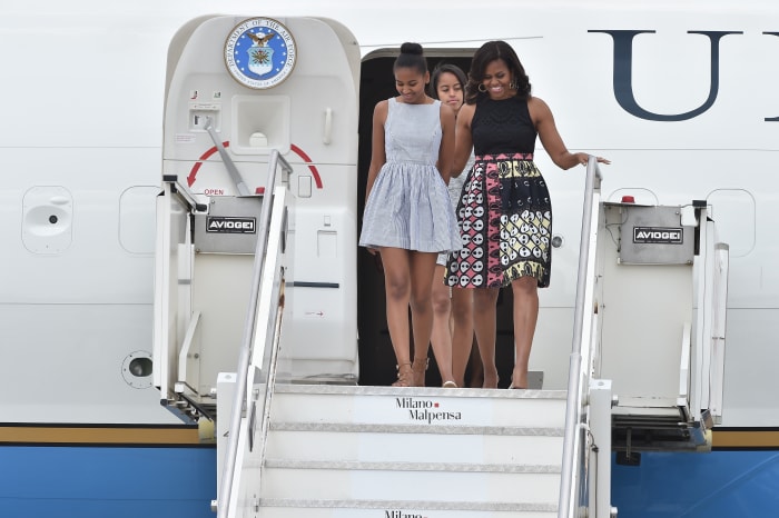 Michelle Obama arrives in Milan on Wednesday accompanied by her mother, Marian Robinson, and her daughters, Sasha and Malia. Photo: Jacopo Raule/Getty Images