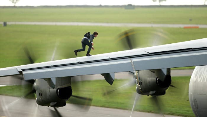 Will he earn miles for that? Tom Cruise as Ethan Hunt in "Mission: Impossible - Rogue Nation." Photo: Christian Black/Paramount Pictures