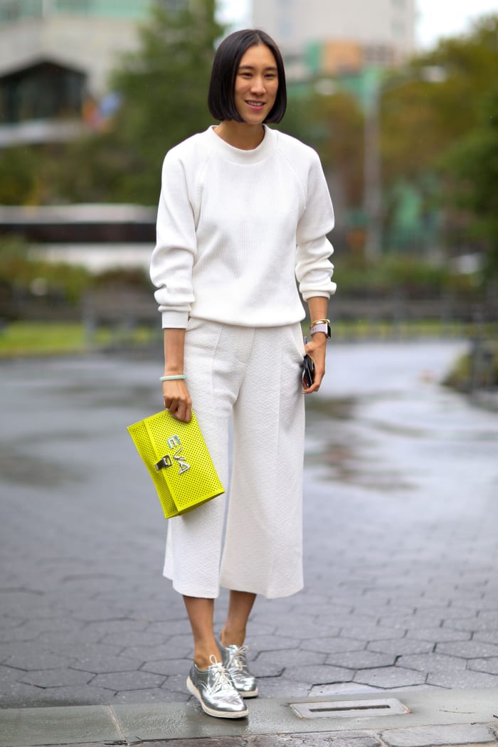 Eva Chen in Atea Oceanie sweater and pants, Cole Haan shoes and Proenza Schouler bag. Photo: Imaxtree