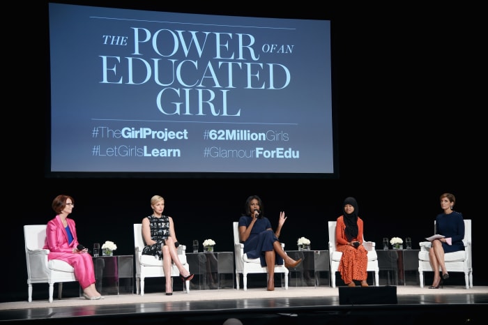 Former Australian Prime Minister Julia Gillard, Founder of Charlize Theron Africa Outreach Project and U.N. Messenger of Peace Charlize Theron, First Lady of the United States Michelle Obama, Girl ambassador from Plan International Nurfahada and Glamour Editor-in-Chief Cindi Leive at The Apollo Theater on Tuesday. Photo: Dimitrios Kambouris/Getty Images for Glamour