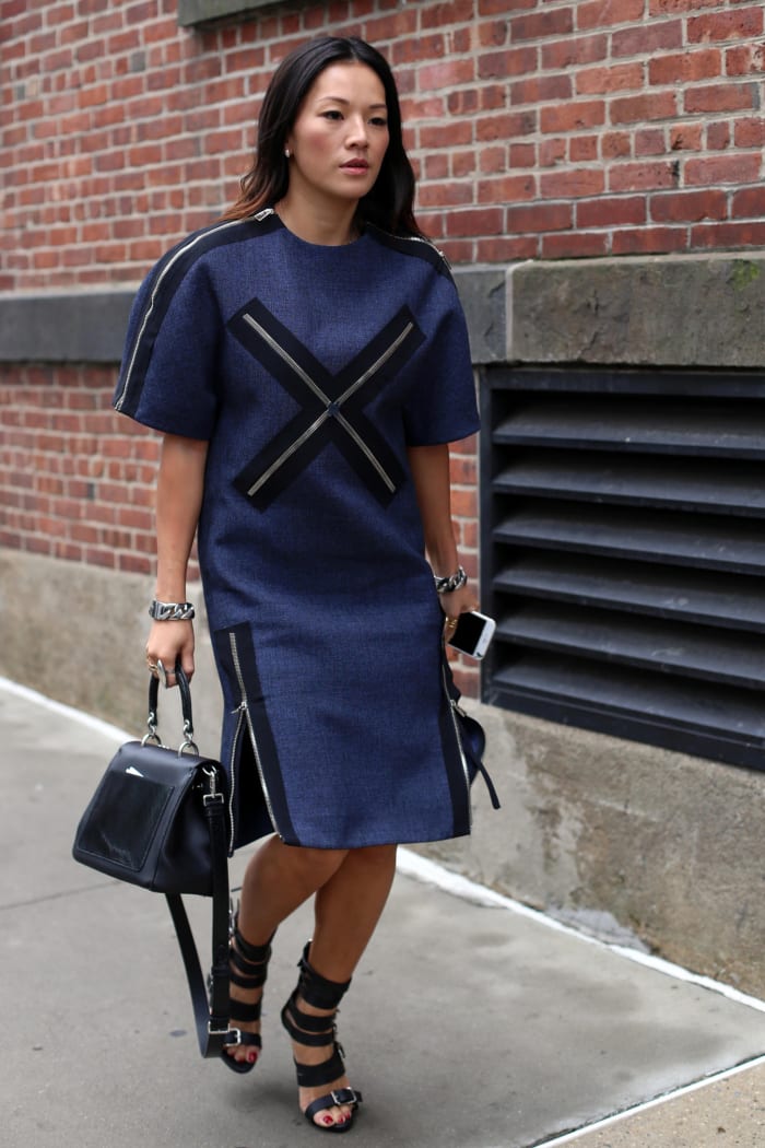Stylist/blogger Tina Leung at New York Fashion Week in a Balenciaga dress, Dior bag and Giuseppe Zanotti shoes. Photo: Angela Datre/Fashionista