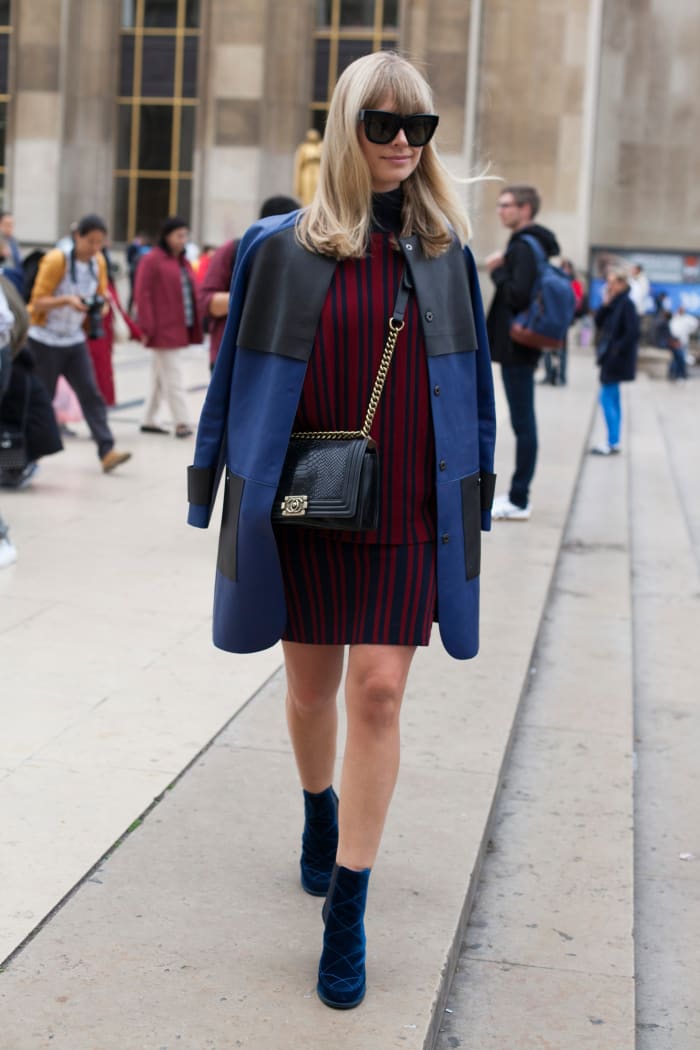 Footwear News Fashion Director Mosha Lundstrom Halbert at Paris Fashion Week in a Tanya Taylor knit, Longchamp jacket and Laurence Dacade boots. Photo: Emily Malan/Fashionista