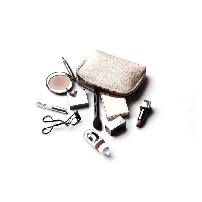The ideal makeup bag is a pared-down one. Photo: @tamirajarrel/Instagram