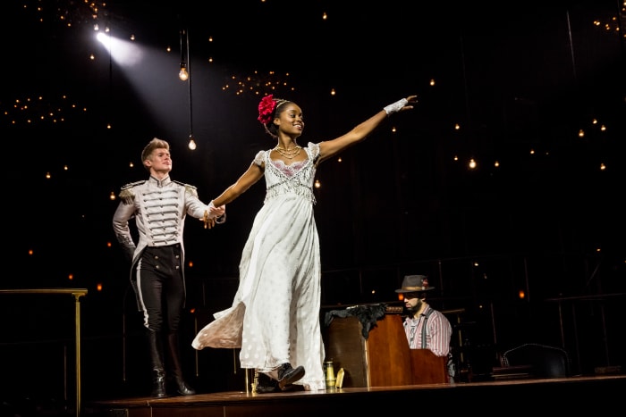 Lucas Steele and Denée Benton in 'Natasha, Pierre and the Great Comet of 1812.' Costume designer Paloma Young also incorporated mod silhouette details inspired by the 1960s/'Camelot'-referential set design by Mimi Lien. -Photo: Chad Batka