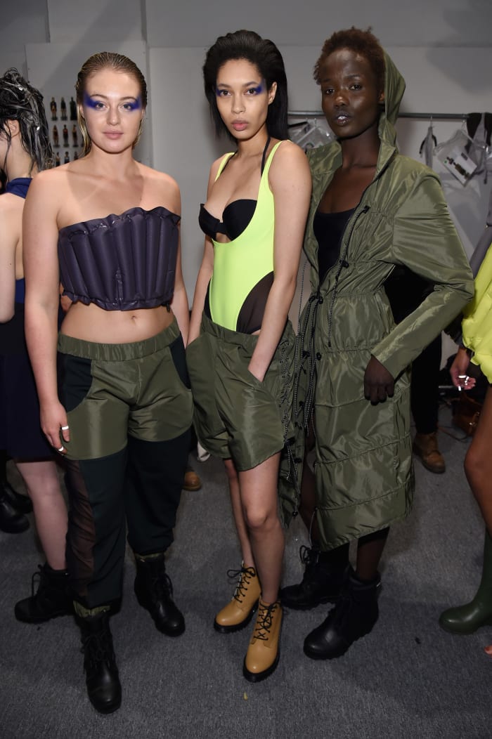 Left to right: Iskra Lawrence, Emerald Mayne and Tina Johnson backstage at the Chromat fall 2017 runway show. Photo: Jamie McCarthy/Getty Images