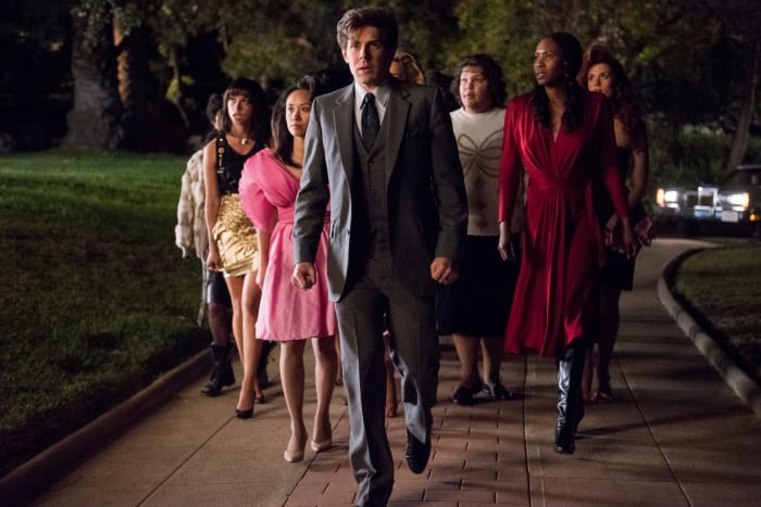 Bash (Chris Lowell, center) in more conservative fare, surrounded by (L-R) Justine (Britt Baron), Jenny (Ellen Wong), Carmen (Brittney Young), Cherry and Rhonda (Kate Nash). Photo: Erica Parise/Netflix