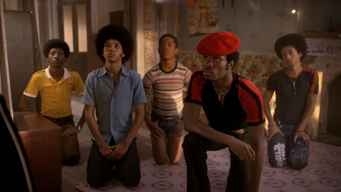Ra Ra (Skylan Brooks), Ezekiel (Justice Smith), Boo Boo (Tremaine Brown Jr)., Shaolin Fantastic (Shameik Moore), Dizzee (Jaden Smith) pay their respects to Grandmaster Flash. Photo: Netflix