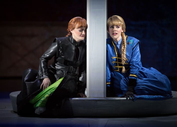 Anna, clad in her McQueen-inspired leather coat, asks Elsa if she wants to build a snowman. Photo: Disney