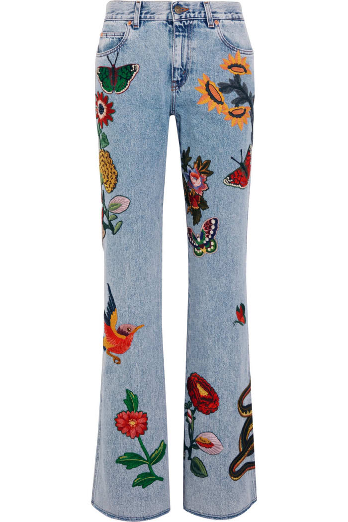 Gucci Appliquéd Mid-Rise Flared Jeans, $2,390, available at Net-a-Porter.