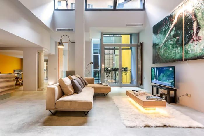 L-shaped sofas are the best sofas. Photo: Airbnb