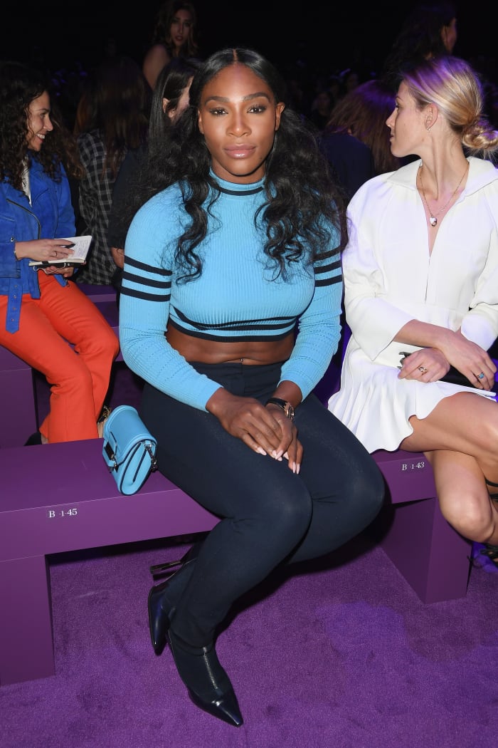 Those abs! Serena Williams at the Versace spring 2017 show during Milan Fashion Week. Photo: Venturelli/WireImage