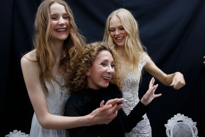 Acra chilling with the models backstage before her spring 2017 bridal runway show. Photo: Thos Robinson