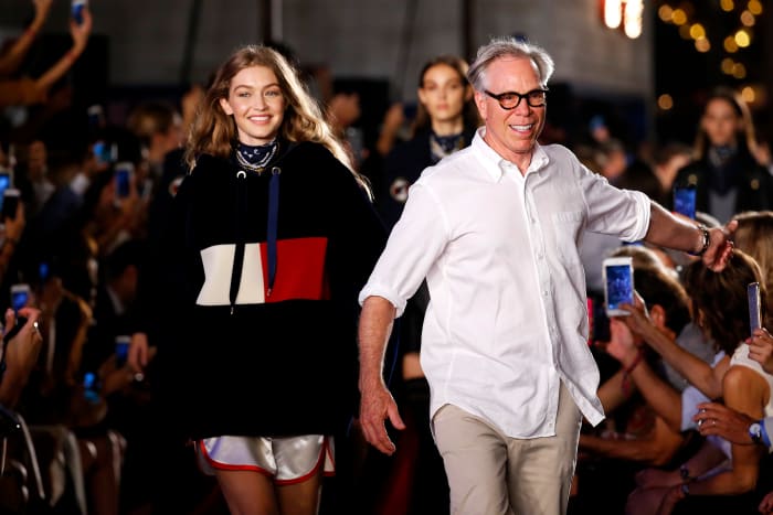 Gigi Hadid and Tommy Hilfiger at the brand's New York Fashion Week runway show on Sept. 9, 2016. Photo: Estrop/Getty Images