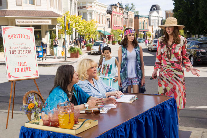 Miss Patty (Liz Torres), Babette (Sally Struthers), Rory and Lorelai prepare for another Stars Hollow original production. Photo: Photo: Saeed Adyani/Netflix