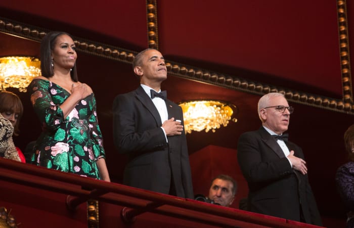 First Lady Michelle Obama and President Barack Obama during the National Anthem. Photo: Chris Kleponis/AFP/Getty Images