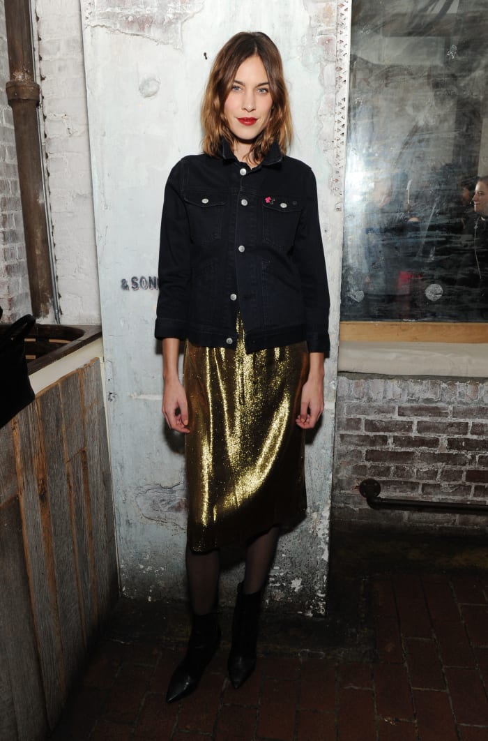Alexa Chung (in an AG denim jacket and an HVN dress) attends the AG dinner for HeForShe. Photo: Craig Barritt/Getty Images