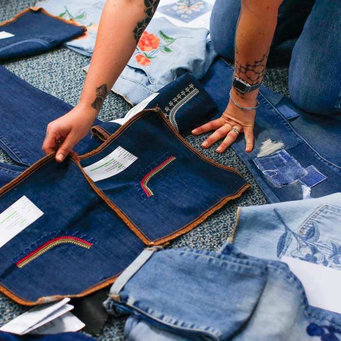 The Gap design team examining embroidered denim from its past, present and future collections. Photo: @gapinc/Instagram