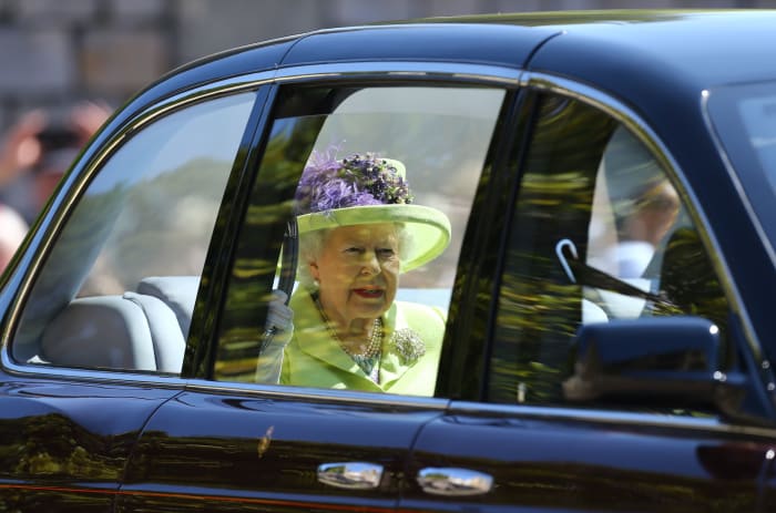 Queen Elizabeth II in an Angela Kelly hat at St George's Chapel at Windsor Castle before the wedding of Prince Harry to Meghan Markle in Windsor, England. Photo: Gareth Fuller - WPA Pool/Getty Images