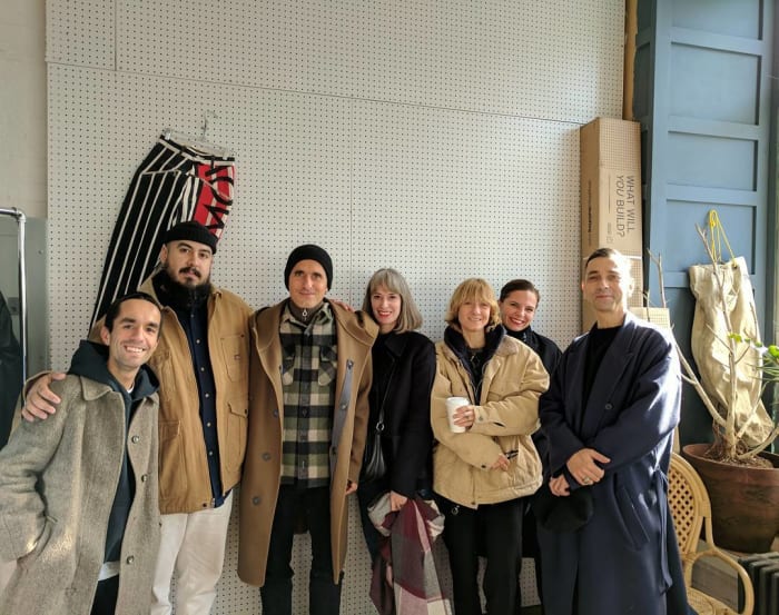 Brian Procell with the Lacoste team at Procell's archive warehouse in Brooklyn. Photo: @procell/Instagram