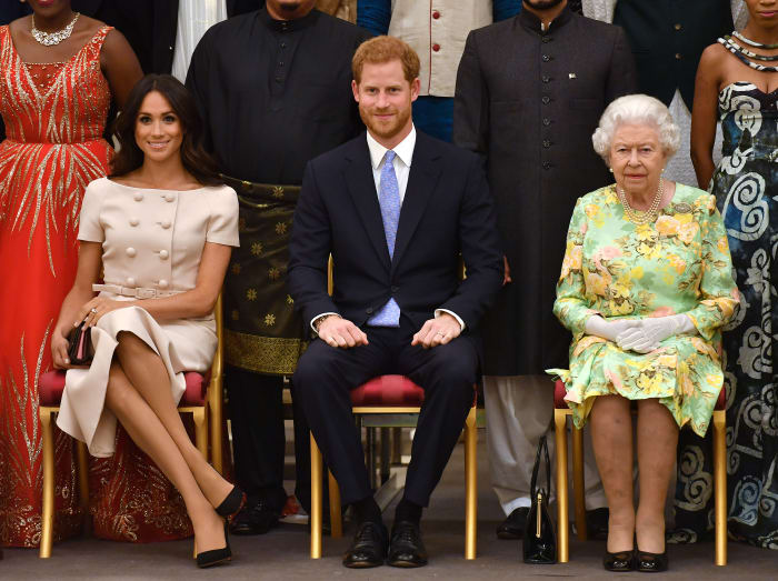 Meghan Markle, Duchess of Sussex, Prince Harry, Duke of Sussex and Queen Elizabeth II at the Queen's Young Leaders Awards Ceremony at Buckingham Palace in London, England. Photo:John Stillwell - WPA Pool/Getty Images