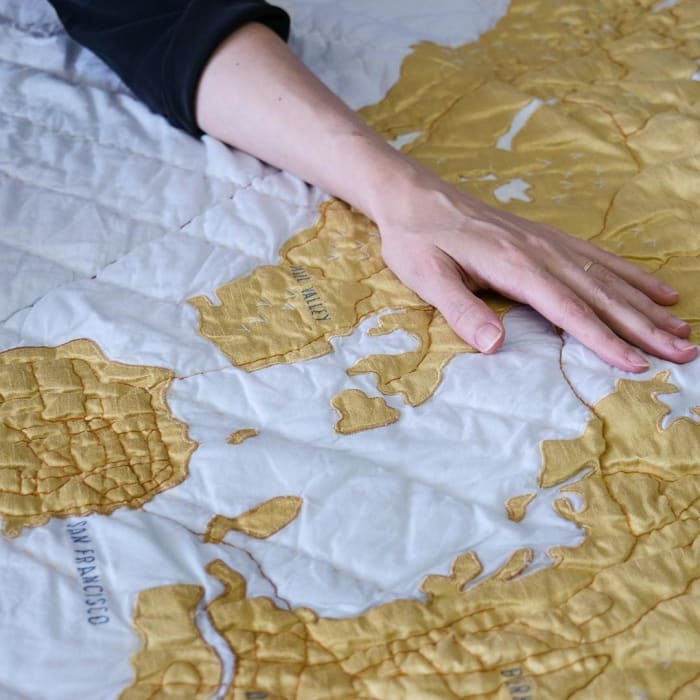 An appliquéd Haptic Lab quilt. Photo: @hapticlab/Instagram