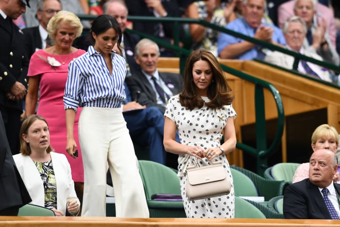 Catherine, Duchess of Cambridge, and Meghan, Duchess of Sussex, at Wimbledon in London. Photo: Clive Mason/Getty Images