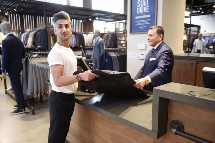 A rare moment of France wearing a "Full Tuck" for the Men's Wearhouse Suit Drive. Photo: Courtesy of Men's Wearhouse