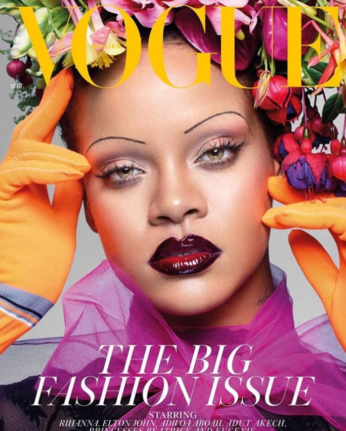 Rihanna wearing a Prada dress and gloves, Savage X Fenty bodysuit and a floral headpiece designed by Makoto Azuma for the September 2018 issue of British Vogue. Photo: Nick Knight/British Vogue