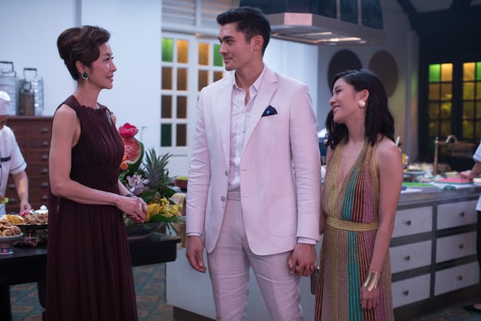 Eleanor (Michelle Yeoh) in Valentino, "Asian Bachelor" Nick (Henry Golding) and Rachel (Constance Wu) in Missoni. Photo: Courtesy of Warner Bros. Pictures