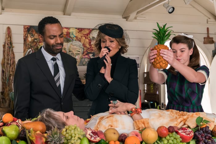 Grace (Jane Fonda, center) and Frankie (Lily Tomlin, on table) in a fantasy sequence. Photo: Melissa Moseley / Netflix