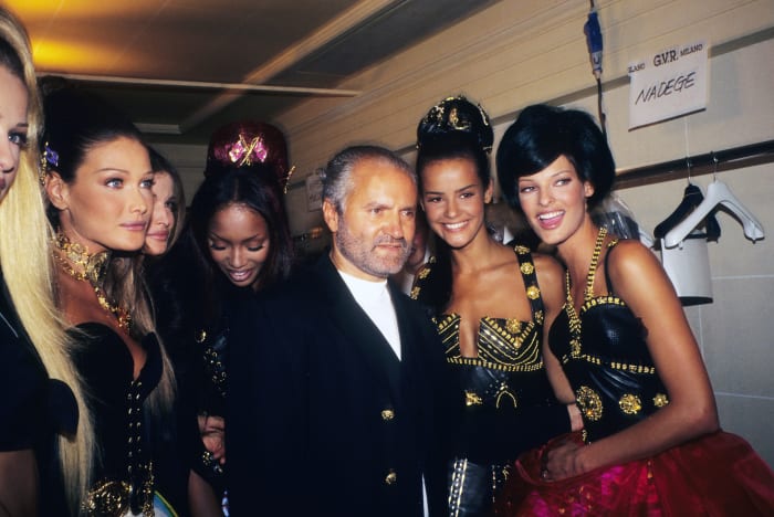 Carla Bruni, Naomi Campbell, Gianni Versace, Nadège du Bospertus and Linda Evangelista attend Gianni Versace Atelier's Fall 1992 show at the Ritz Hotel in Paris. Photo: Foc Kan/Wireimage