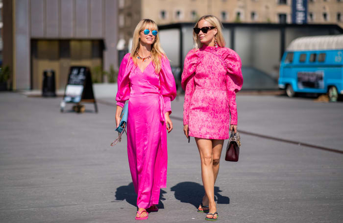 Jeannette Madsen and Thora Valdimars wearing flip-flops during Copenhagen Fashion Week. Photo: Christian Vierig/Getty Images