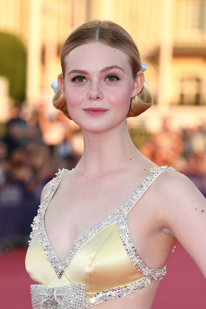 Fanning wearing "evening" pigtails at the "Galveston" premiere during the Deauville Film Festival. Photo: Pascal Le Segretain/Getty Images