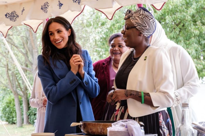 Meghan Markle with women of the Hubb Community Kitchen. Photo: @KensingtonRoyal/Twitter