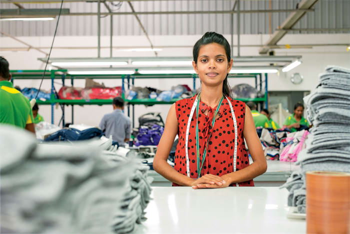 A worker inside the Hirdaramani Mihila Factory in Sri Lanka, a Fair Trade certified factory that makes clothing for Patagonia. Photo: Patagonia