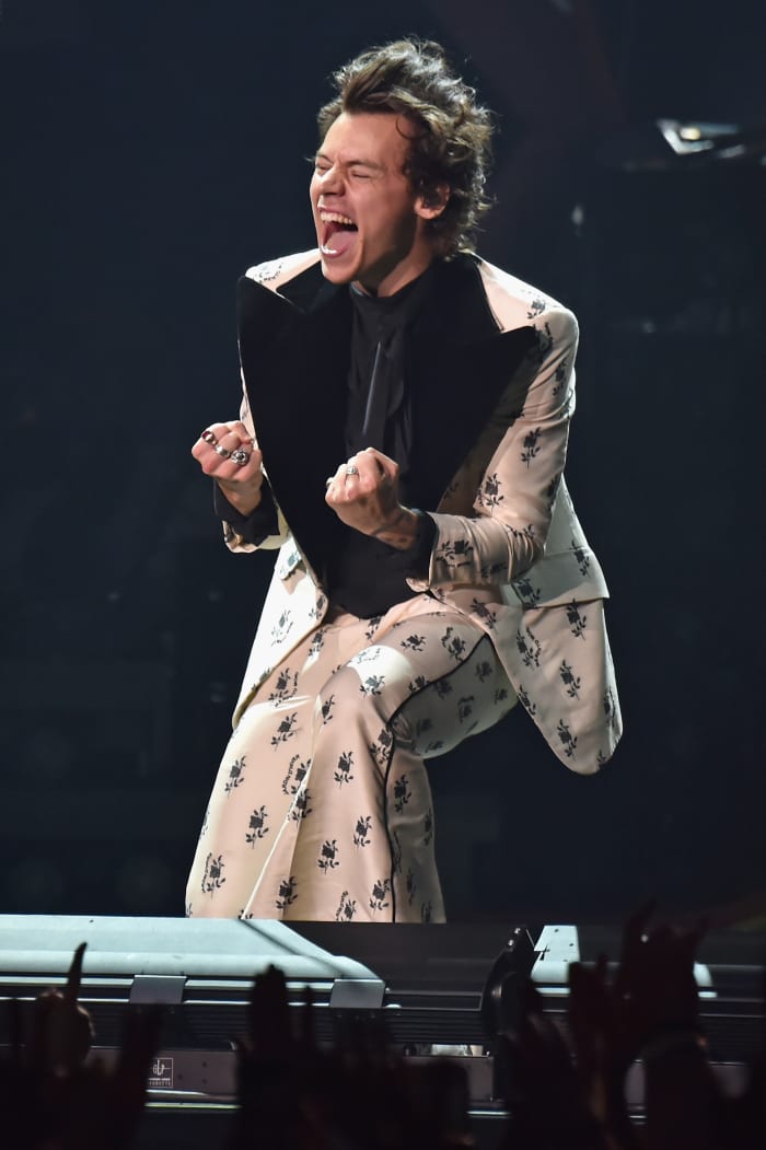 Harry Styles wearing Gucci during a concert, expressing how we feel about Harry Styles wearing Gucci for next year's Met Gala. Photo: Kevin Mazur/Getty Images