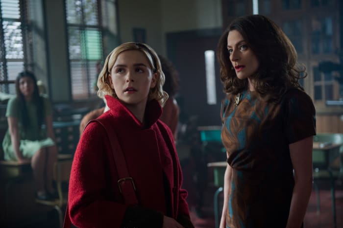 Sabrina Spellman (Kiernan Shipka) and Miss Wardwell, post "makeover" with her Ann-Margret-inspired voluminous hair. Photo: Diyah Pera/Courtesy of Netflix