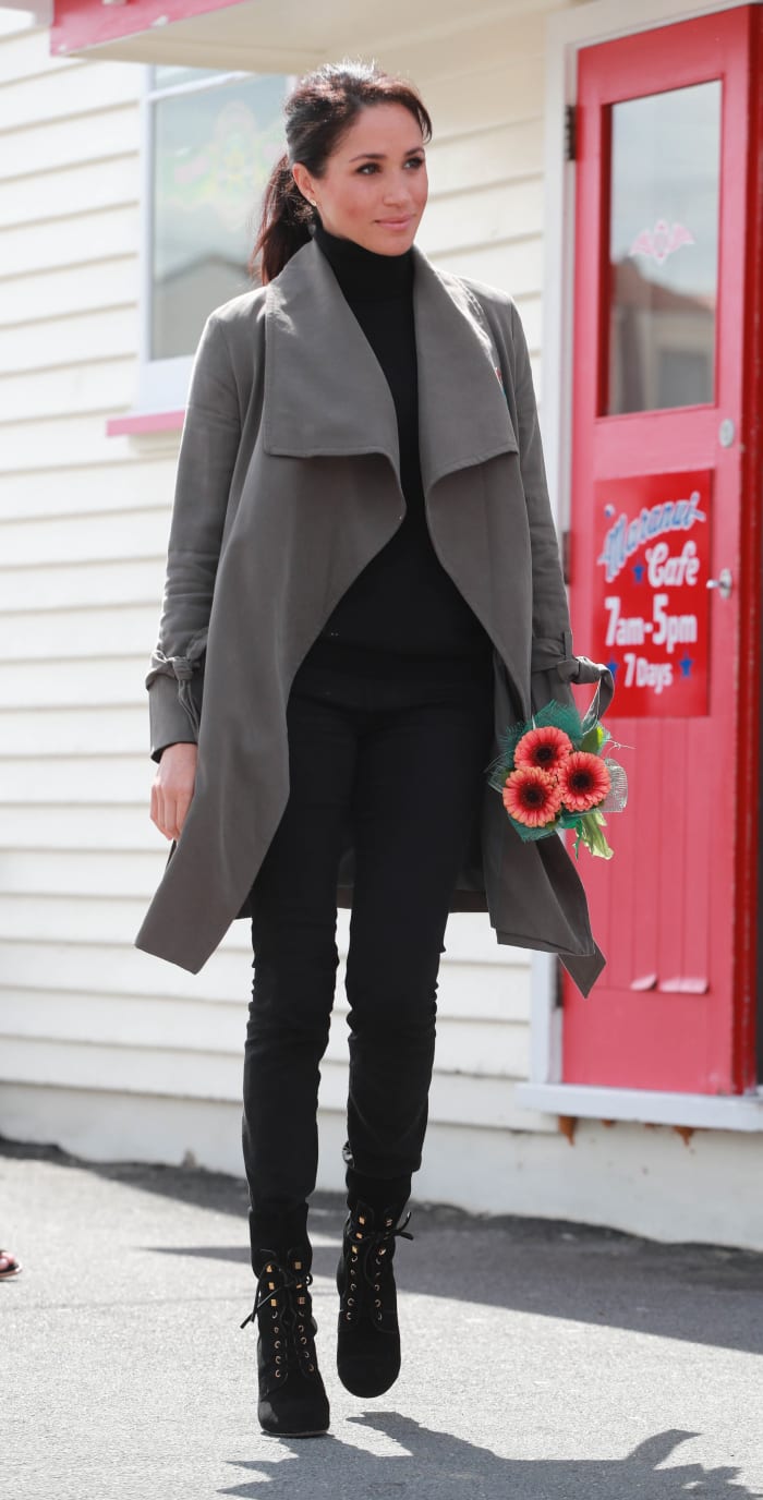 Duchess of Sussex Meghan Markle in a trench coat by Club Monaco. Photo: Ian Vogler/Pool/Getty Images